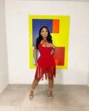 Fashionable and sexy solid color fringed suspender skirt