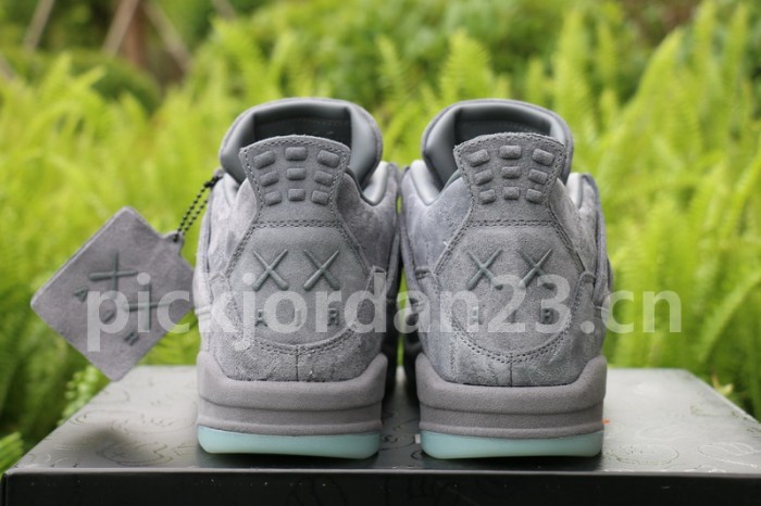 Authentic Kaws x Air Jordan 4 “Cool Grey”