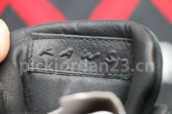 Authentic Kaws x Air Jordan 4 Black “Cool Grey”